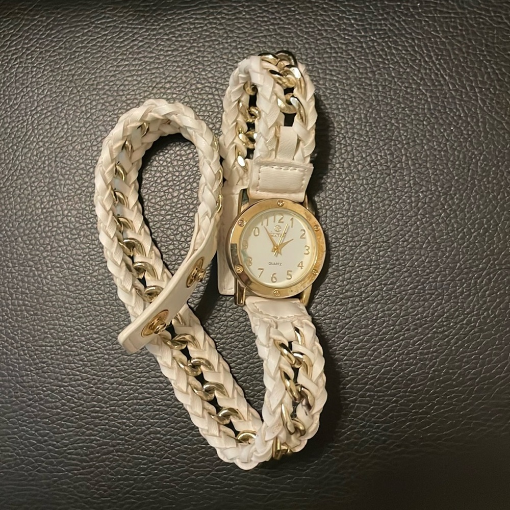 Gold and white watch